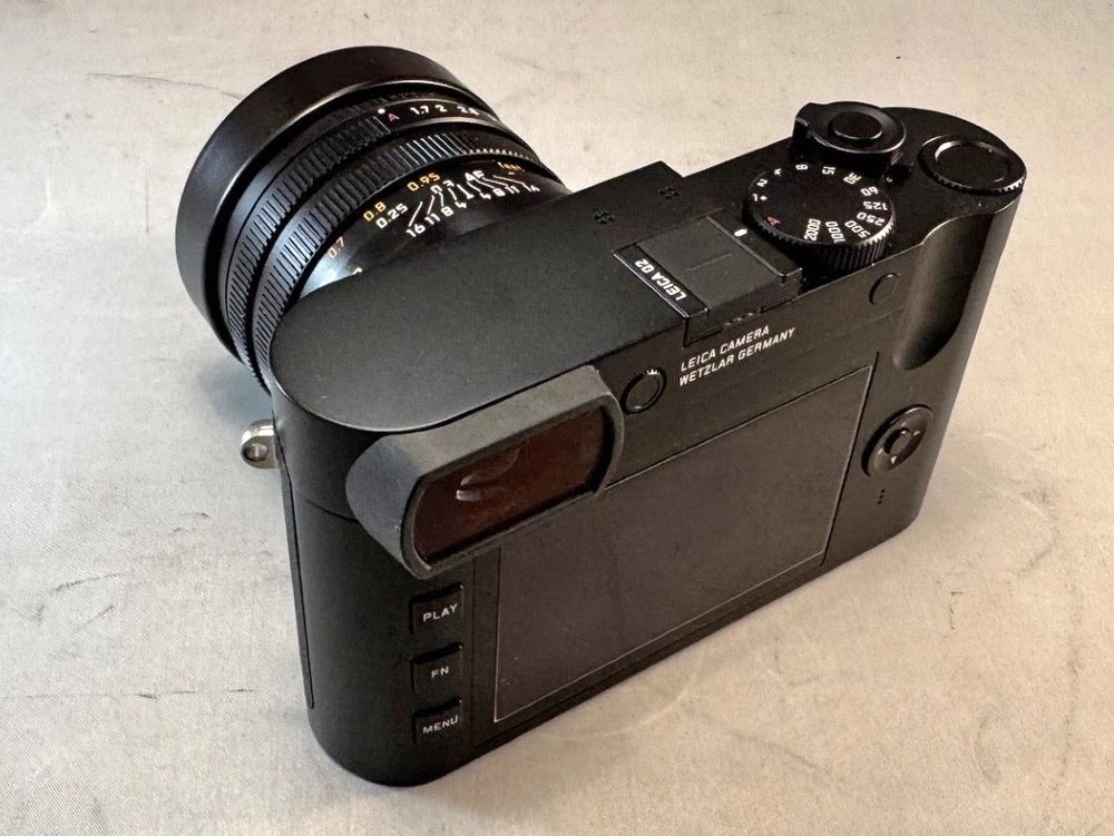 Leica Q2 camera. Mint Condition. Leather Half Case and Lens Cap. UV Filter