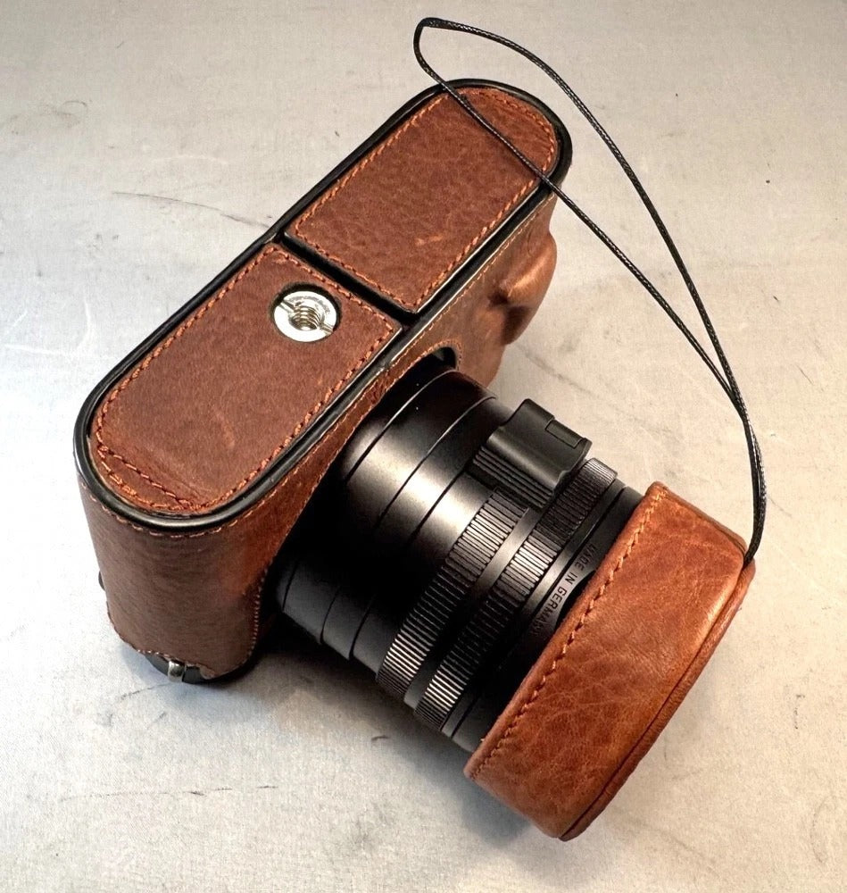 Leica Q2 camera. Mint Condition. Leather Half Case and Lens Cap. UV Filter