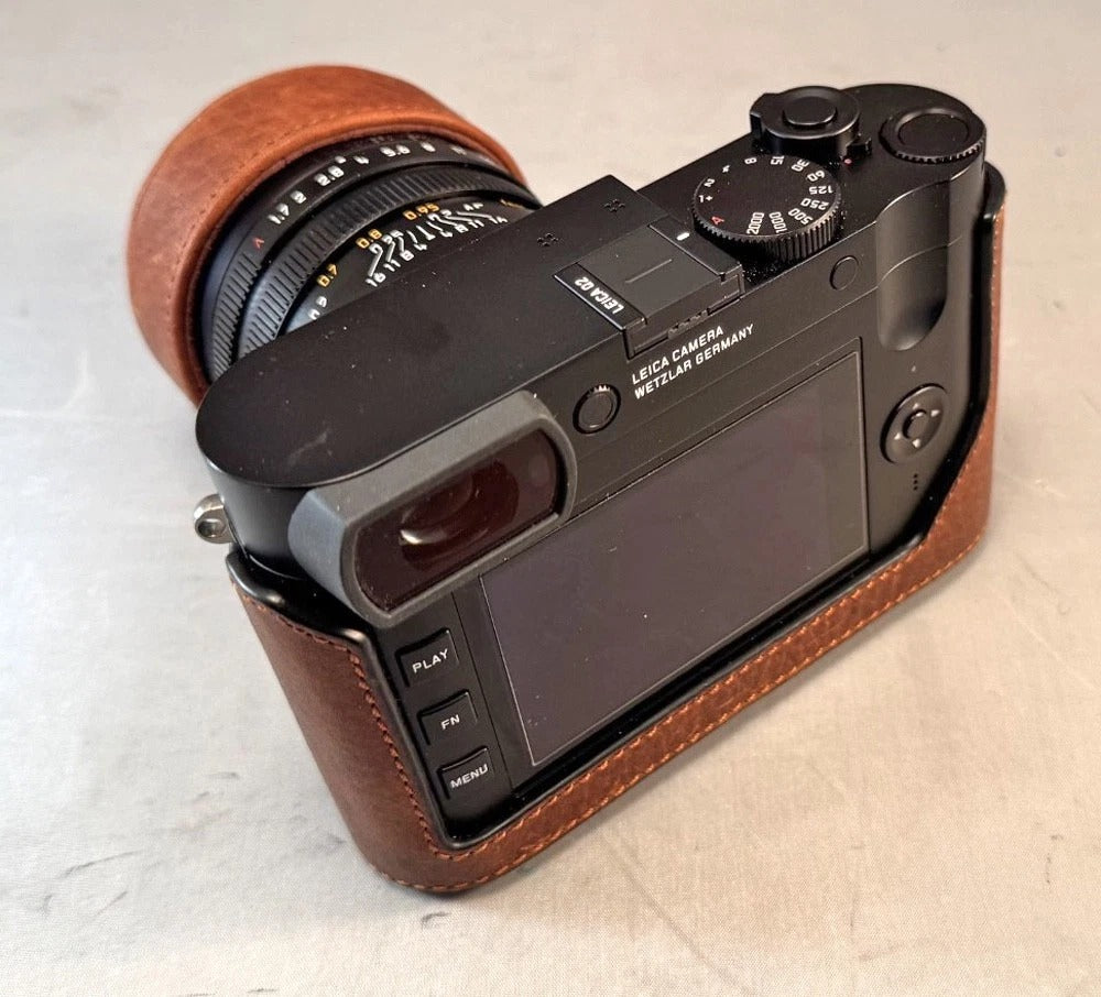Leica Q2 camera. Mint Condition. Leather Half Case and Lens Cap. UV Filter