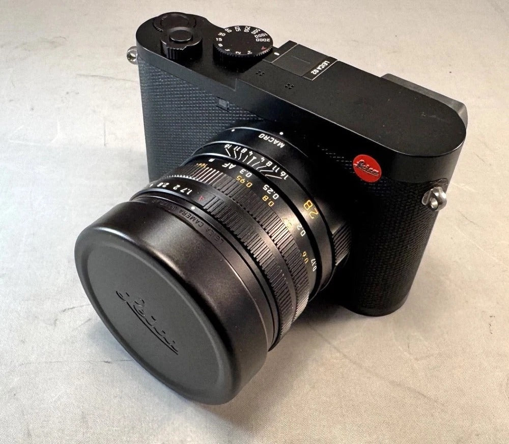 Leica Q2 camera. Mint Condition. Leather Half Case and Lens Cap. UV Filter
